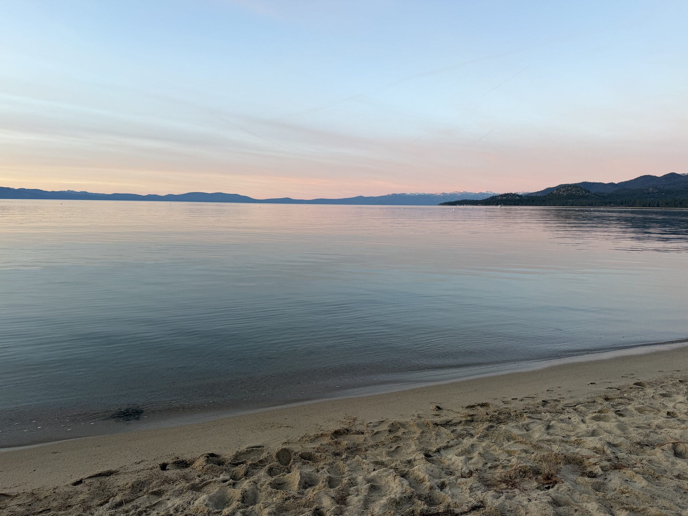 Calm sunset light over Lake Tahoe from the shoreline